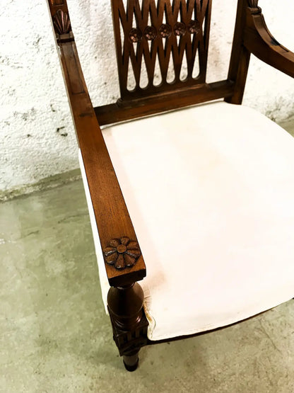 Poltrona coloniale in Teak originale con seduta imbottita