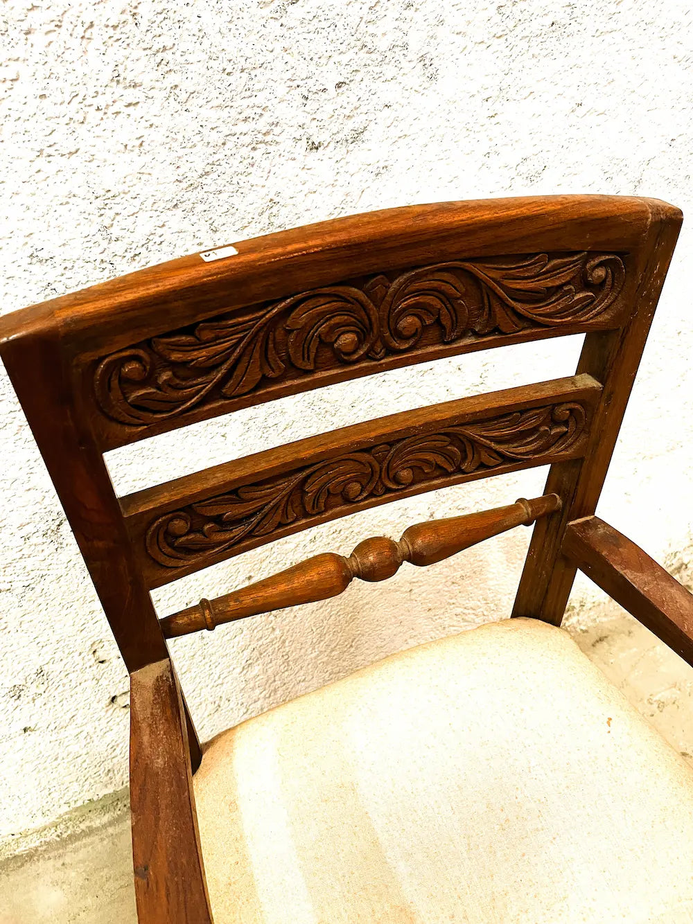 Poltroncina coloniale in Teak originale con seduta imbottita
